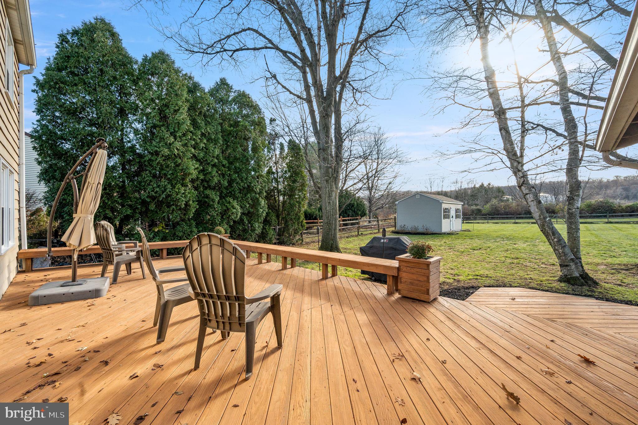 21 Birch Road Malvern, PA 19355 - Photo 34 of 42 Deck with steps to the expansive yard!