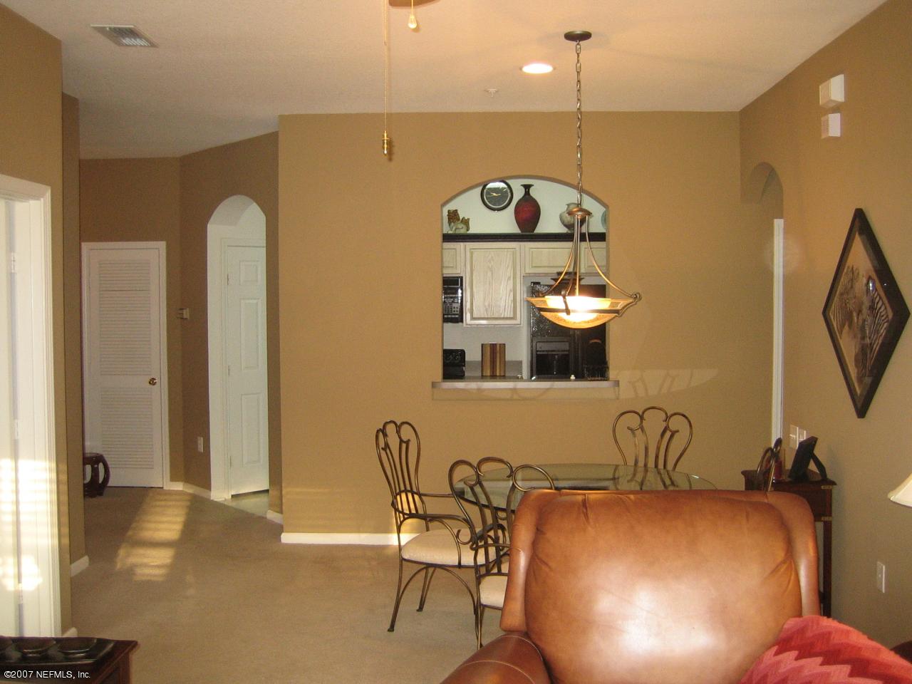 10550 Baymeadows Road, Unit 514 Jacksonville, FL 32256 - Photo 5 of 8 Dining and Living Room
