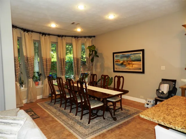 a view of a livingroom with furniture and window