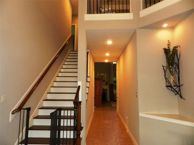 a view of hallway with stairs