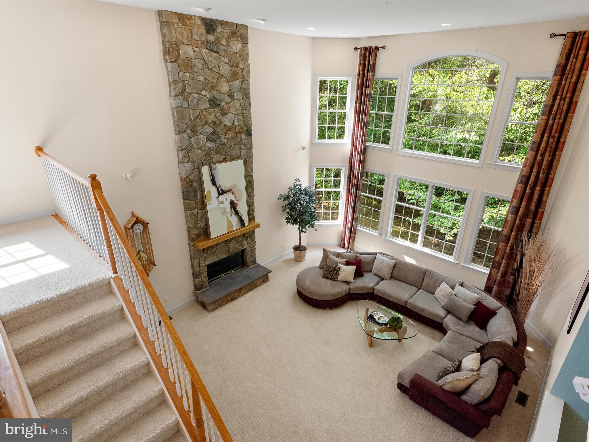 452 Springview Lane Phoenixville, PA 19460 - Photo 30 of 74 a living room with furniture and a large window