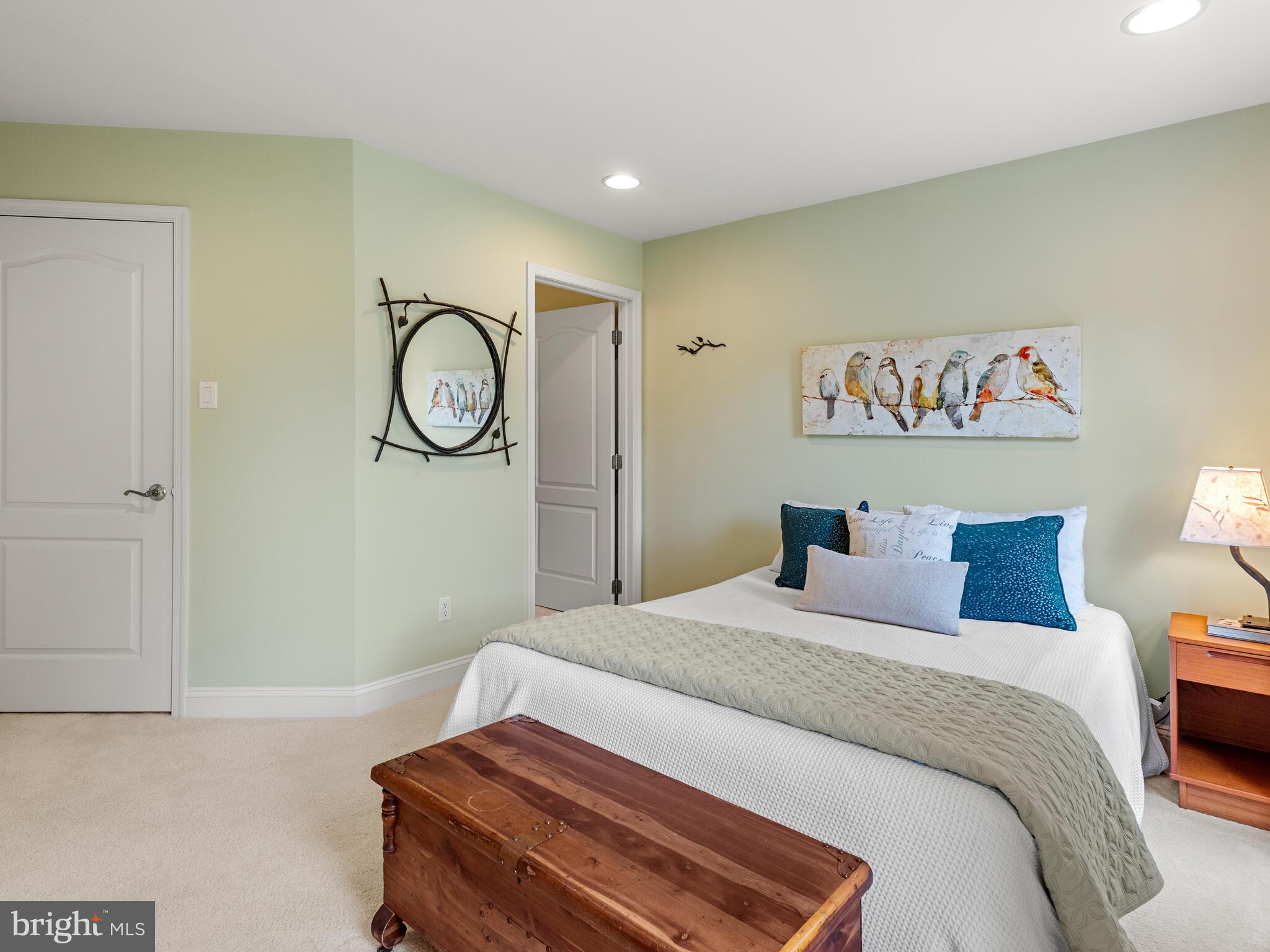 452 Springview Lane Phoenixville, PA 19460 - Photo 51 of 74 a bedroom with a bed and a table in it