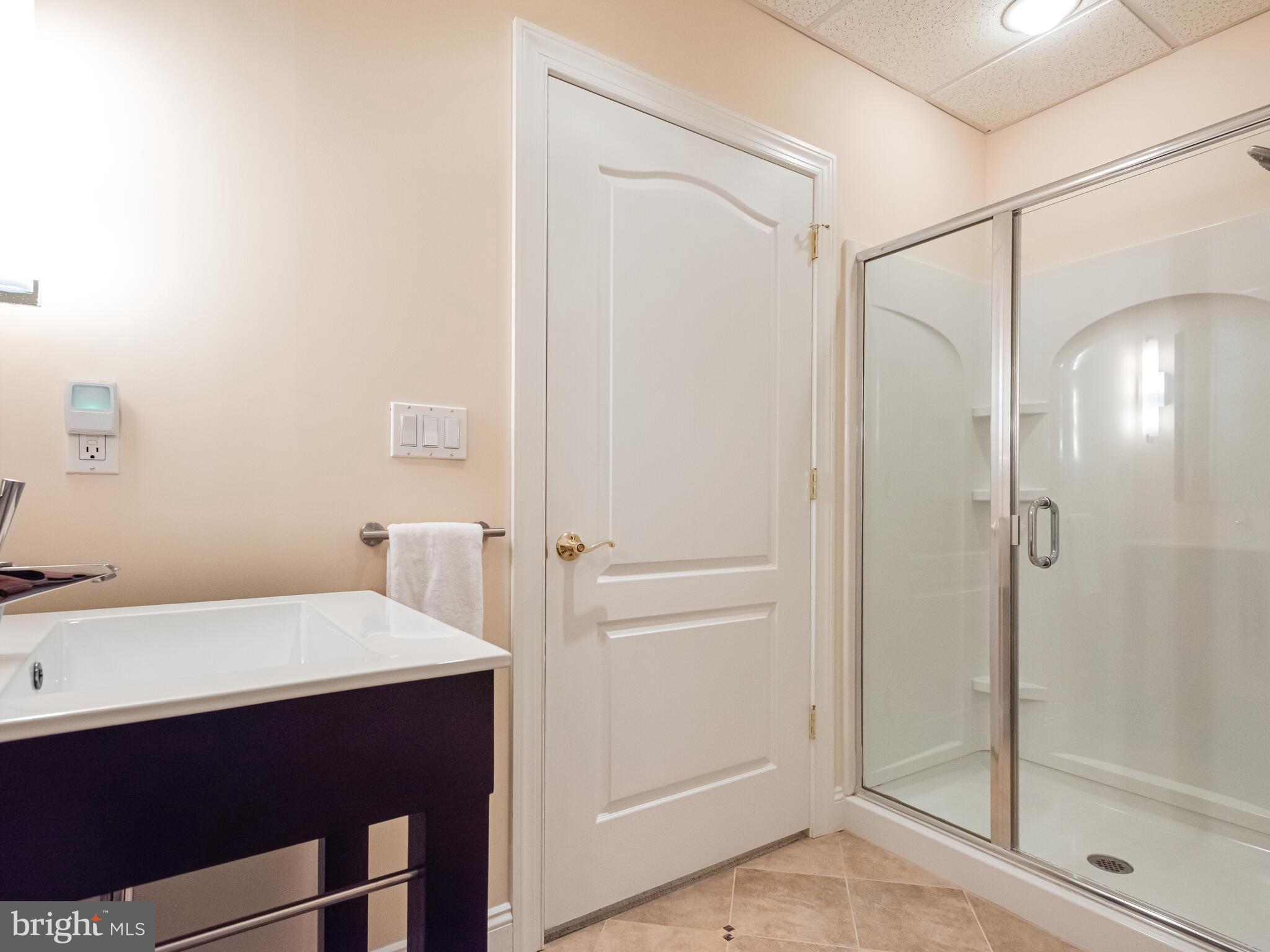 452 Springview Lane Phoenixville, PA 19460 - Photo 58 of 74 a bathroom with a sink and a mirror