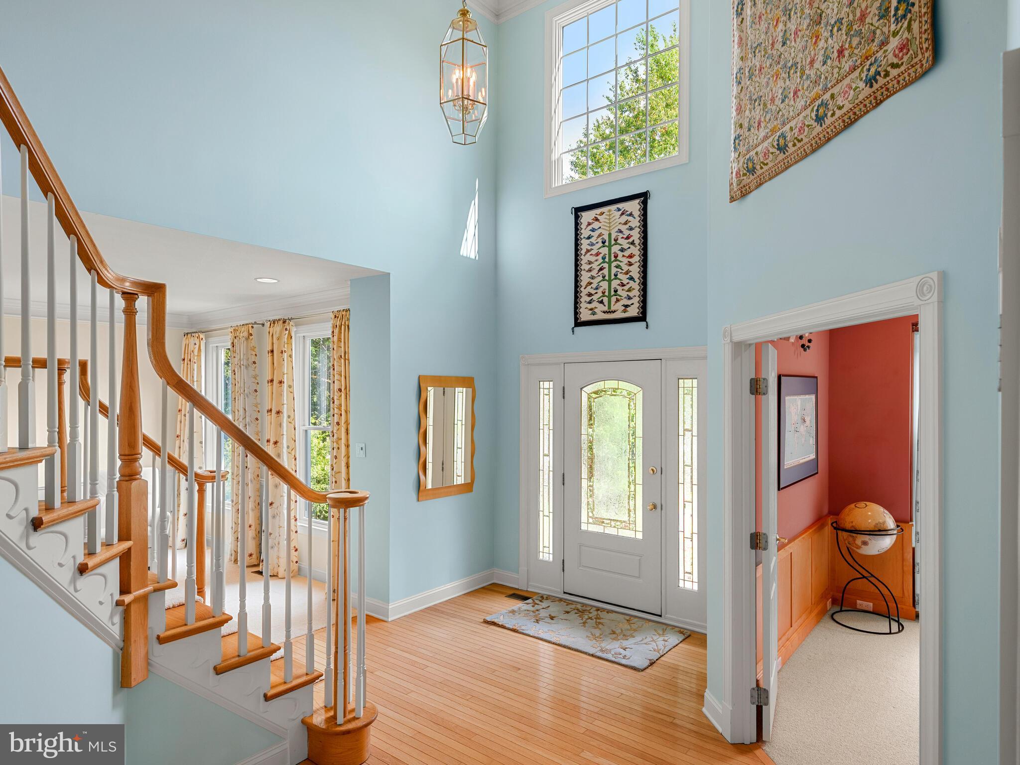452 Springview Lane Phoenixville, PA 19460 - Photo 6 of 74 a view of an entryway with wooden floor and windows