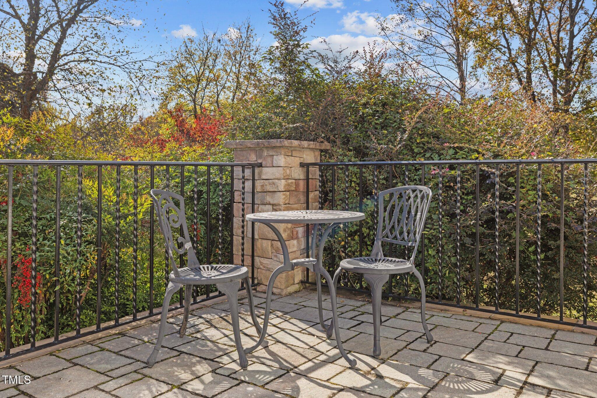7205 Penny Road Raleigh, NC 27606 - Photo 32 of 50 a view of a chairs and table in the patio