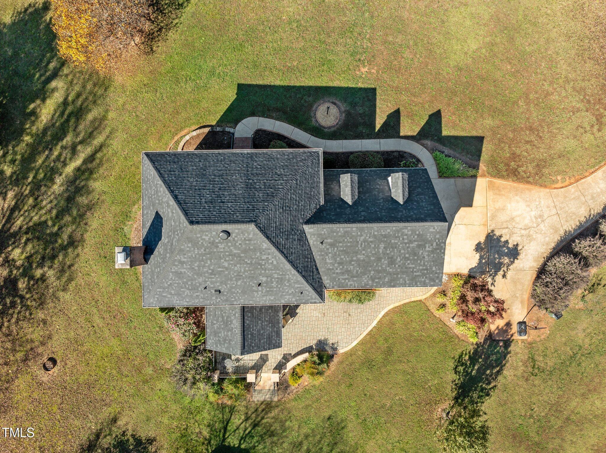 7205 Penny Road Raleigh, NC 27606 - Photo 46 of 50 a view of roof deck with table and chairs