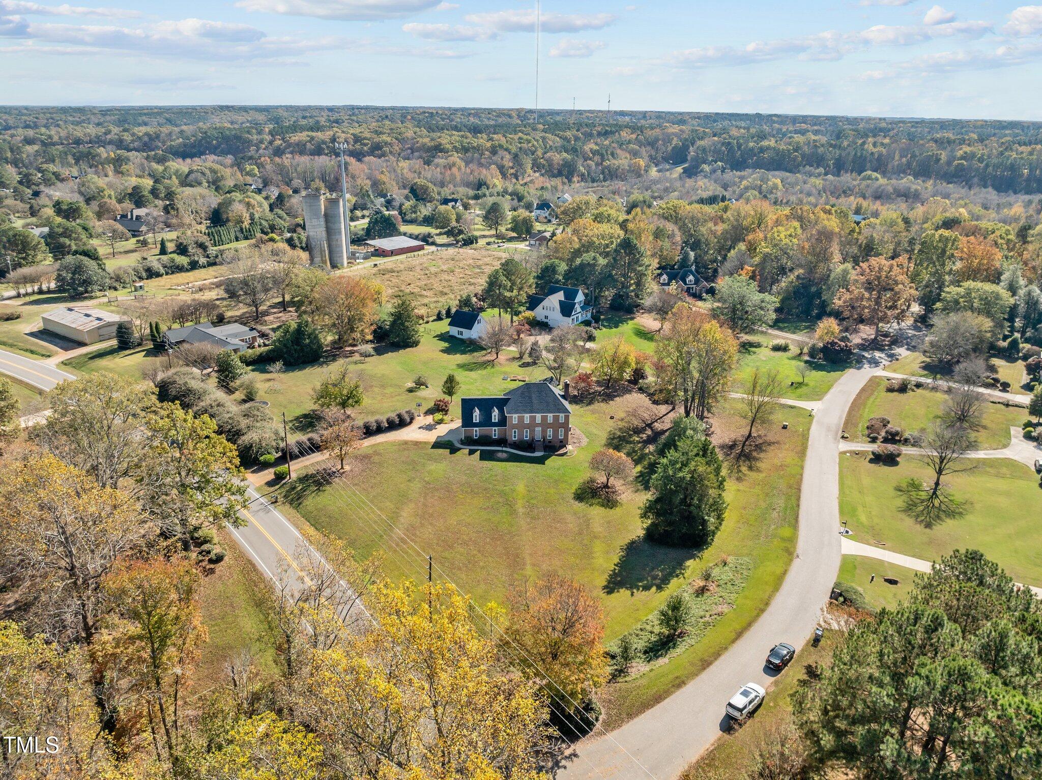 7205 Penny Road Raleigh, NC 27606 - Photo 47 of 50 an aerial view of residential houses with outdoor space