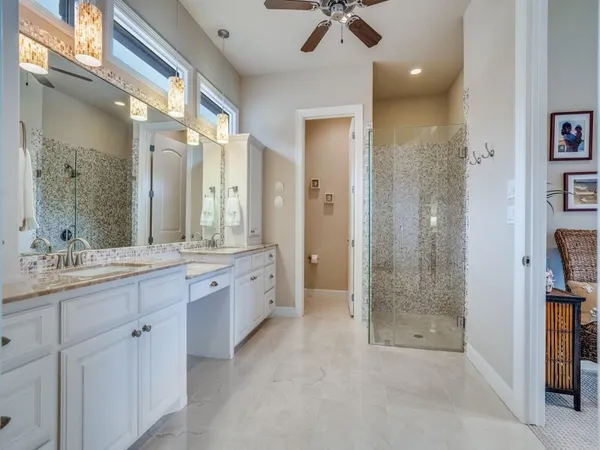 a utility room with sink dryer and washer