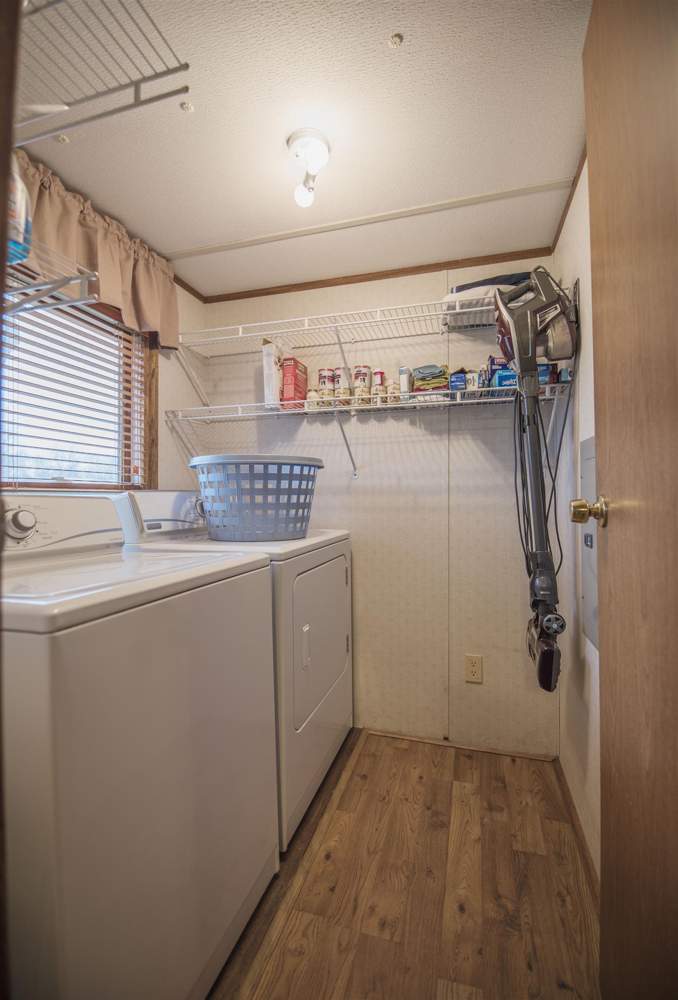123 Norris Perry Road Manchester, TN 37355 - Photo 10 of 23 a storage room with washer and dryer