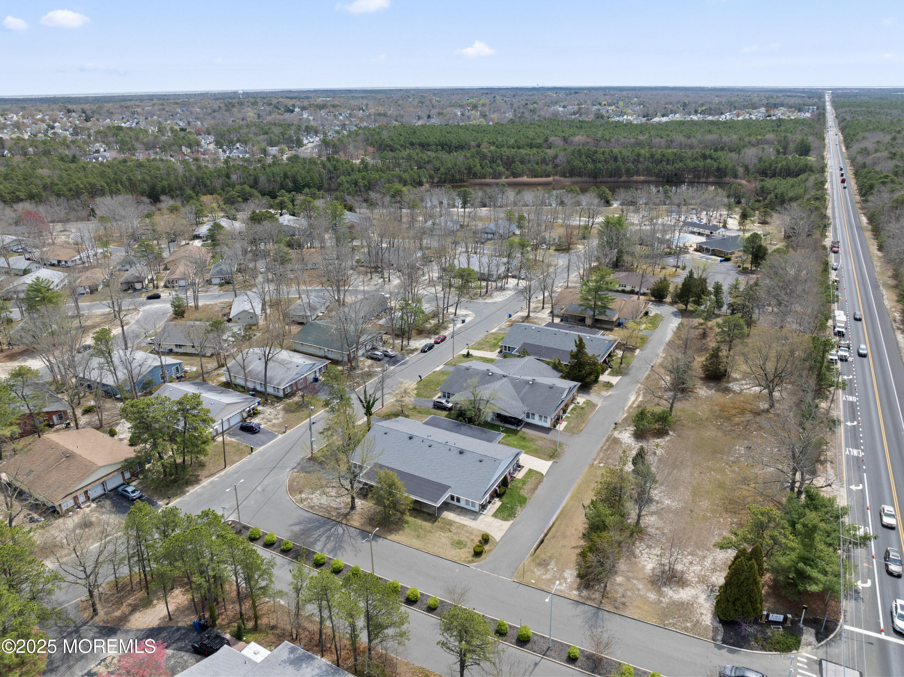 20 Sycamore Road, Unit D Manahawkin, NJ 08050 - Photo 3 of 19 an aerial view of a city with lots of residential buildings