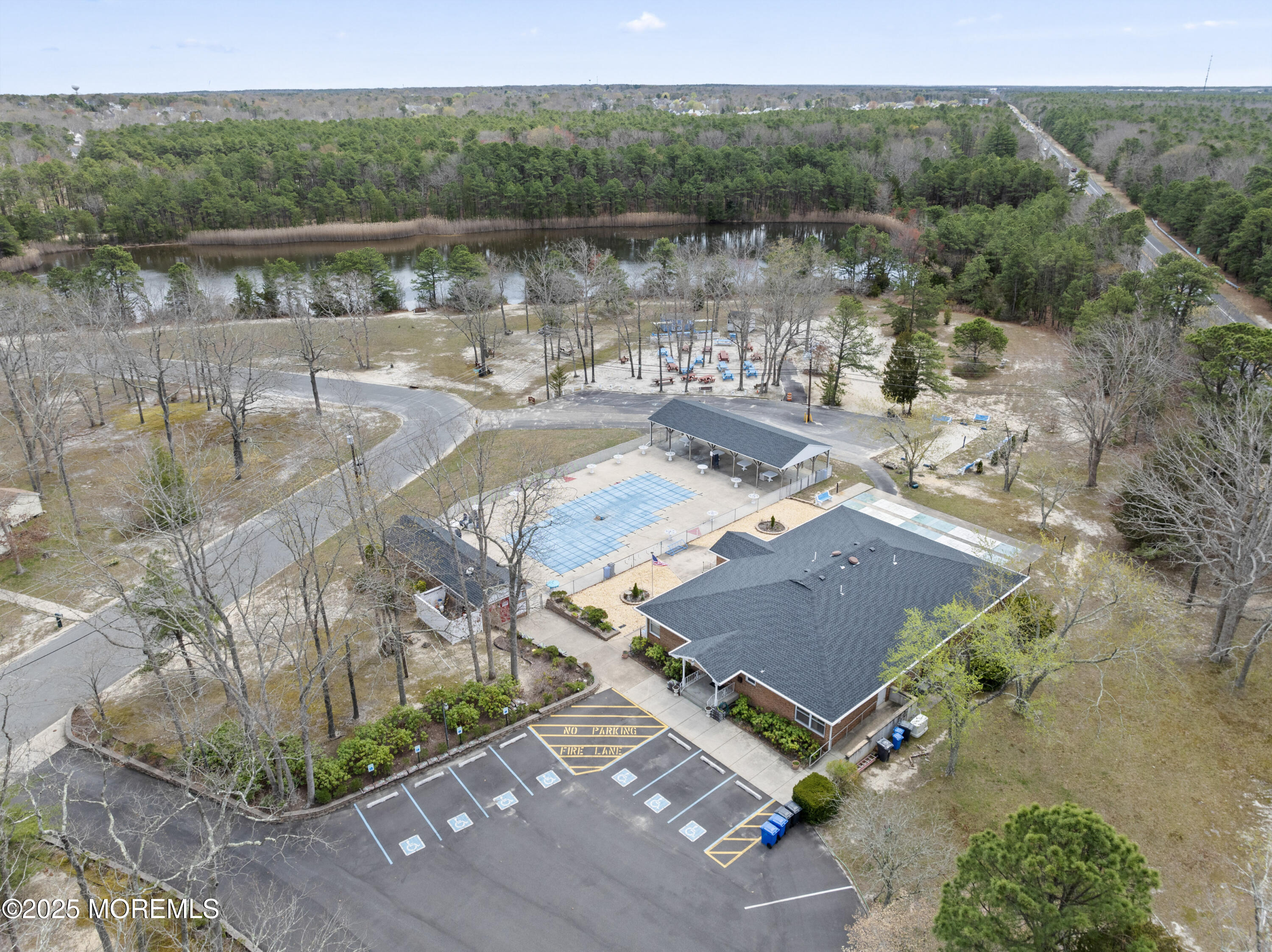 20 Sycamore Road, Unit D Manahawkin, NJ 08050 - Photo 4 of 19 an aerial view of a house with lake view