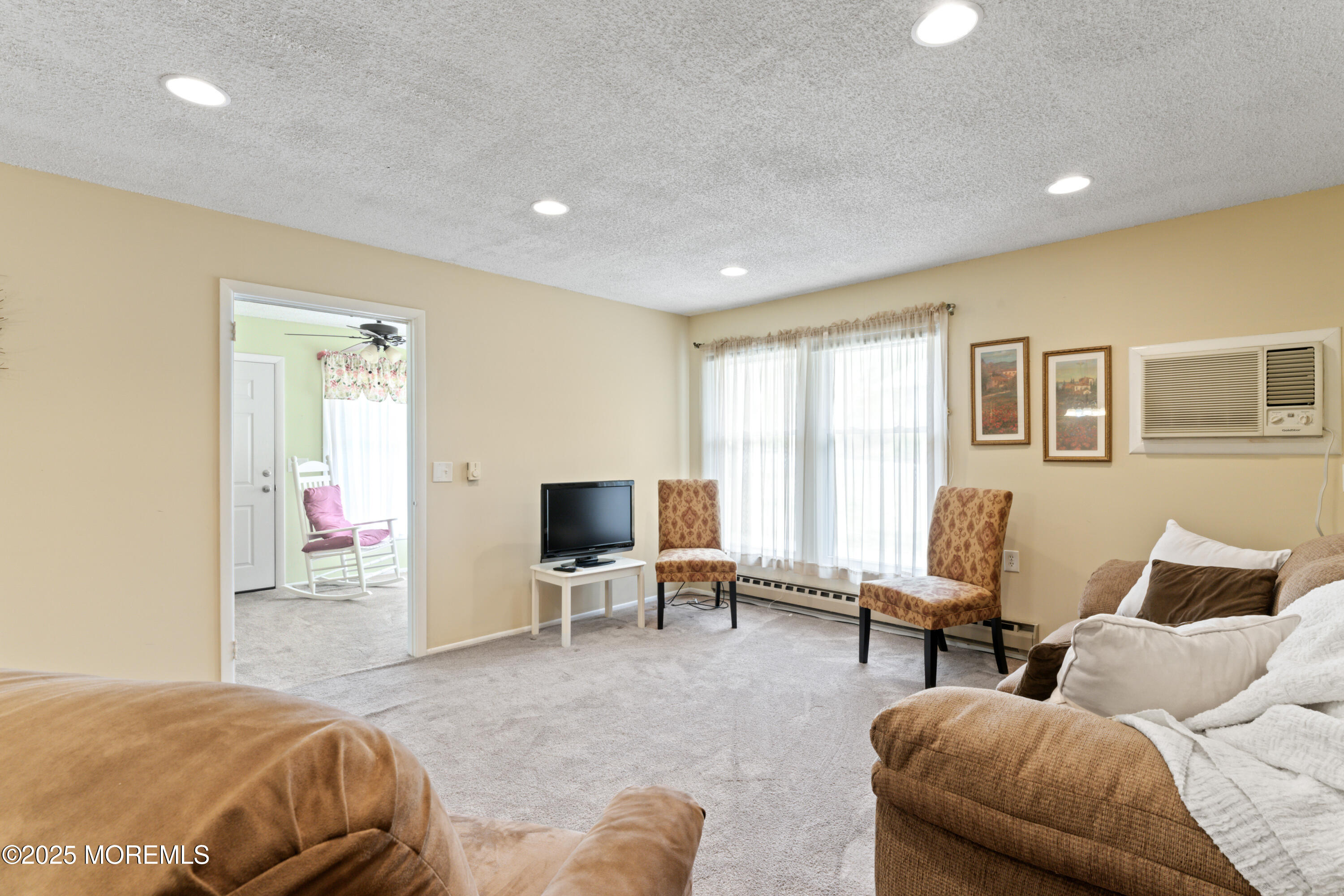 20 Sycamore Road, Unit D Manahawkin, NJ 08050 - Photo 8 of 19 a bedroom with furniture and a window