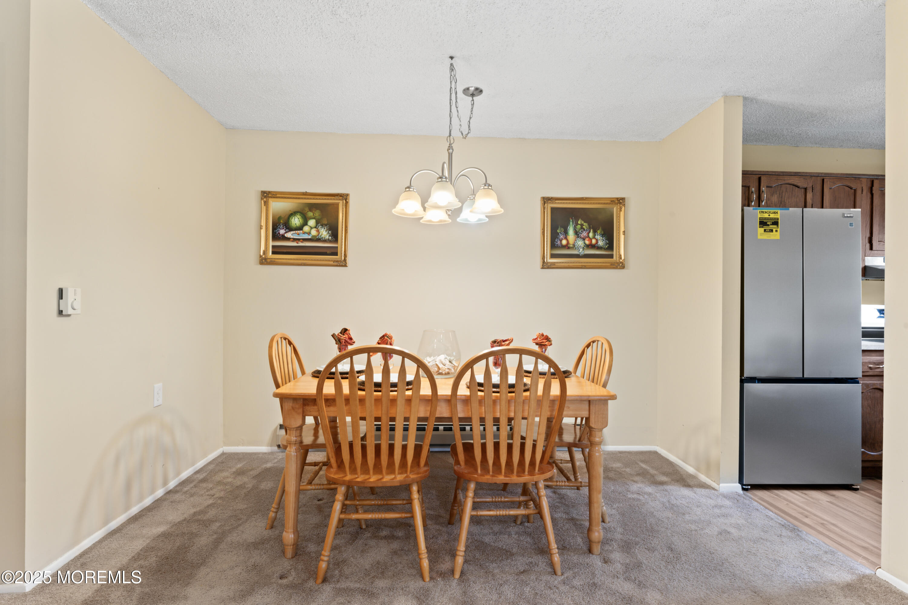 20 Sycamore Road, Unit D Manahawkin, NJ 08050 - Photo 9 of 19 a view of a dining room with furniture
