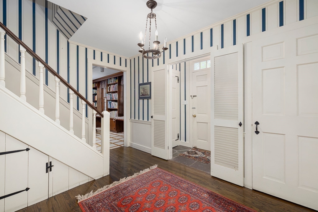 200 Highcrest Road Fall River, MA 02720 - Photo 17 of 27 a living room with wooden floor and stairs