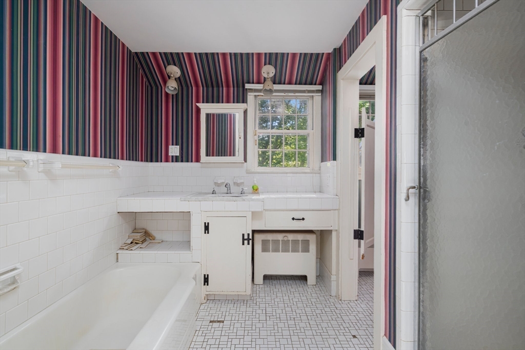 200 Highcrest Road Fall River, MA 02720 - Photo 24 of 27 a bathroom with a sink and a bathtub