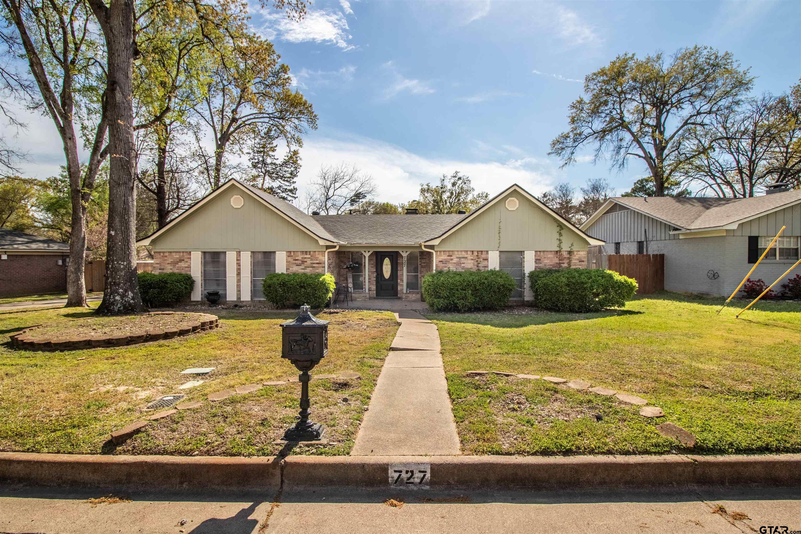a view of a house with swimming pool