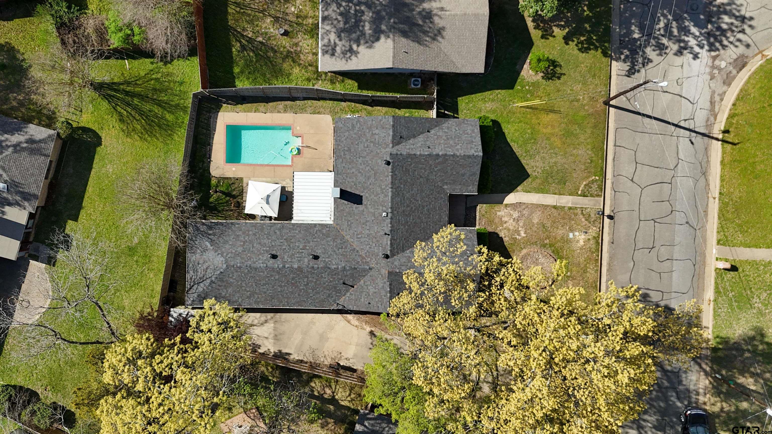 727 Oxford Drive Tyler, TX 75703 - Photo 33 of 33 an aerial view of a house with a yard