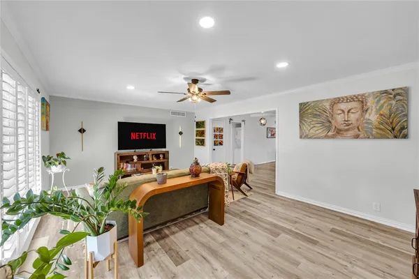 a bed room with a bed and a tv