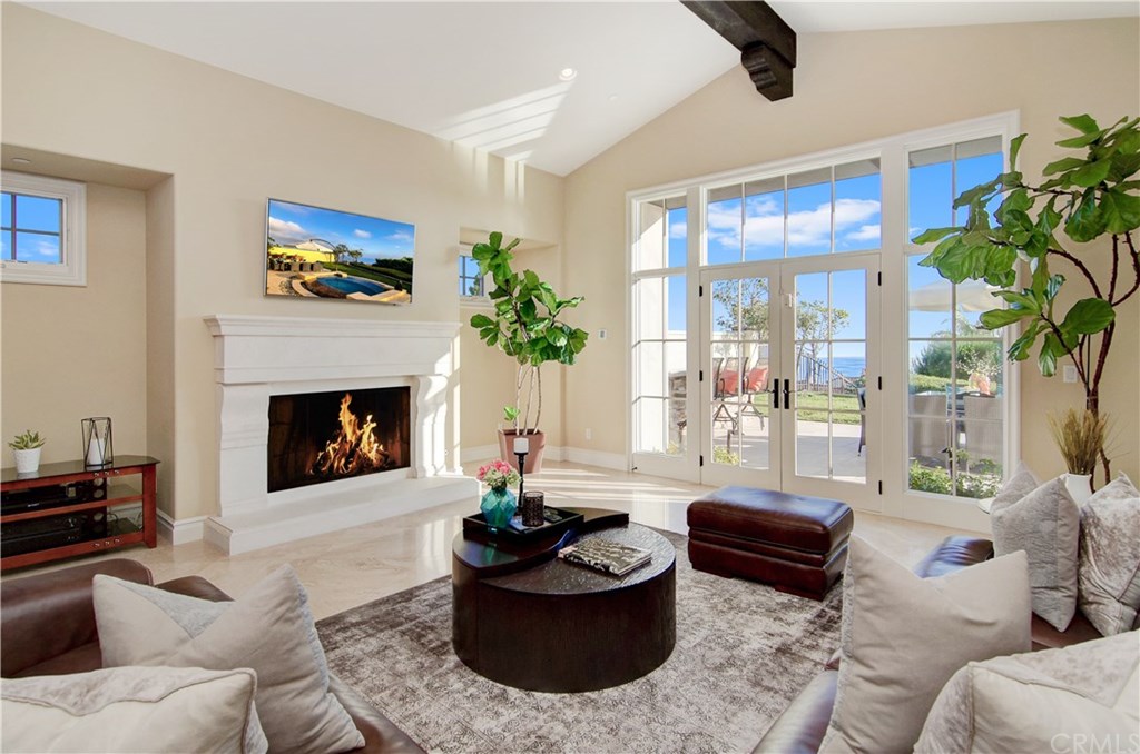 82 Archipelago Drive Newport Coast, CA 92657 - Photo 5 of 50 Family room with French Doors to patio