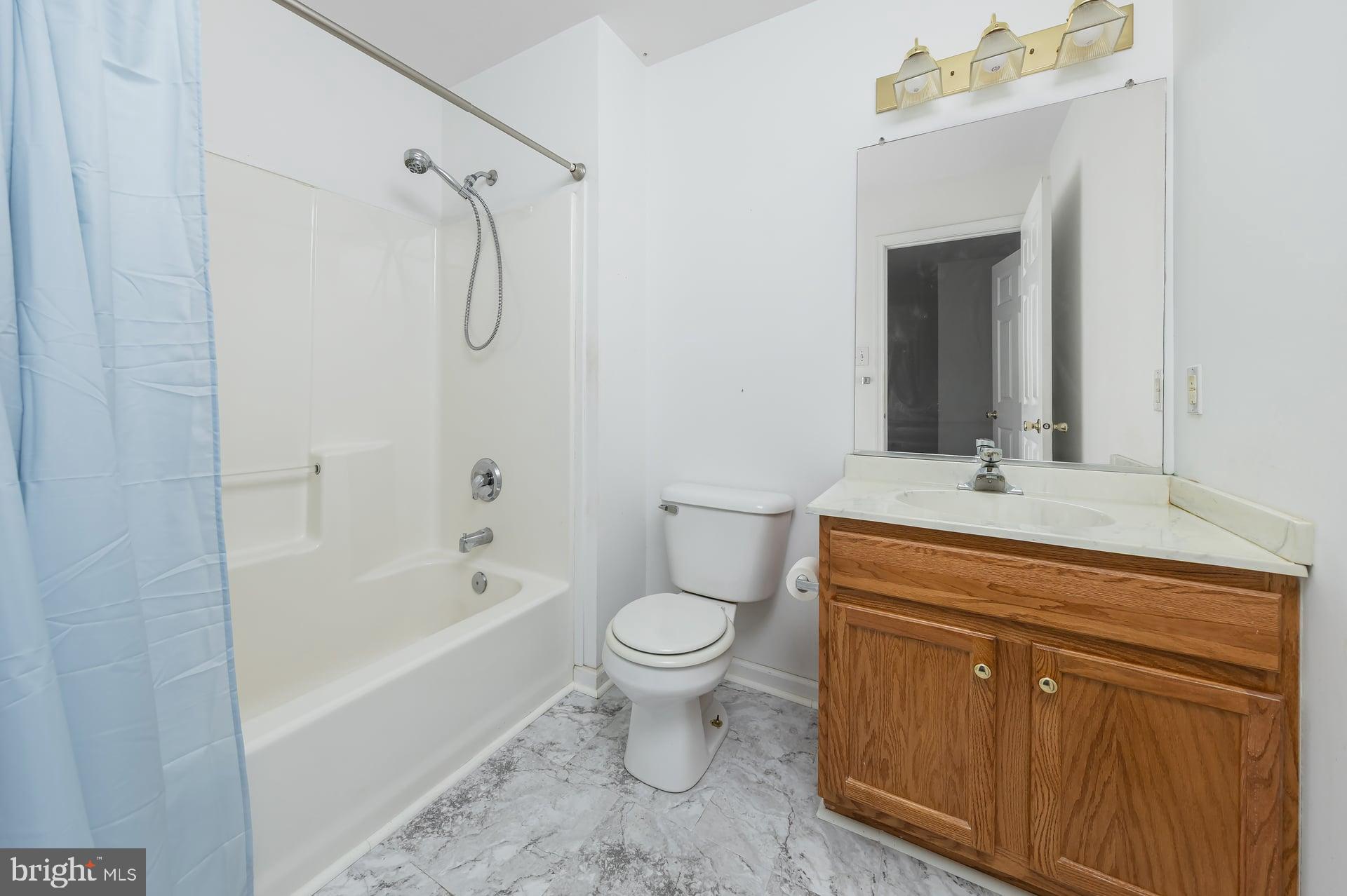 164 Clarks Pond Road Bridgeton, NJ 08302 - Photo 38 of 38 a bathroom with a sink a toilet and shower