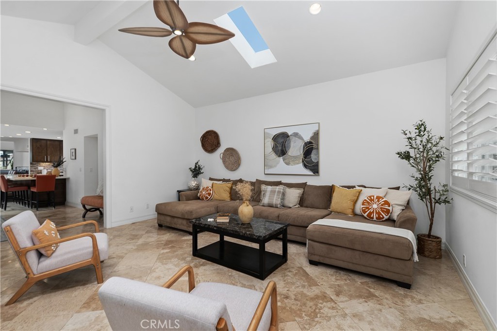 154 12th Street Seal Beach, CA 90740 - Photo 26 of 39 a living room with furniture and kitchen view