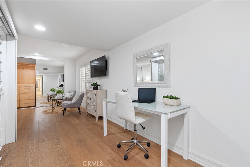 154 12th Street Seal Beach, CA 90740 - Photo 27 of 39 a view of a livingroom with furniture and a flat screen tv