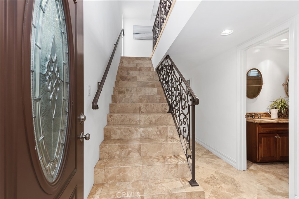 154 12th Street Seal Beach, CA 90740 - Photo 3 of 39 a view of a hallway with entryway