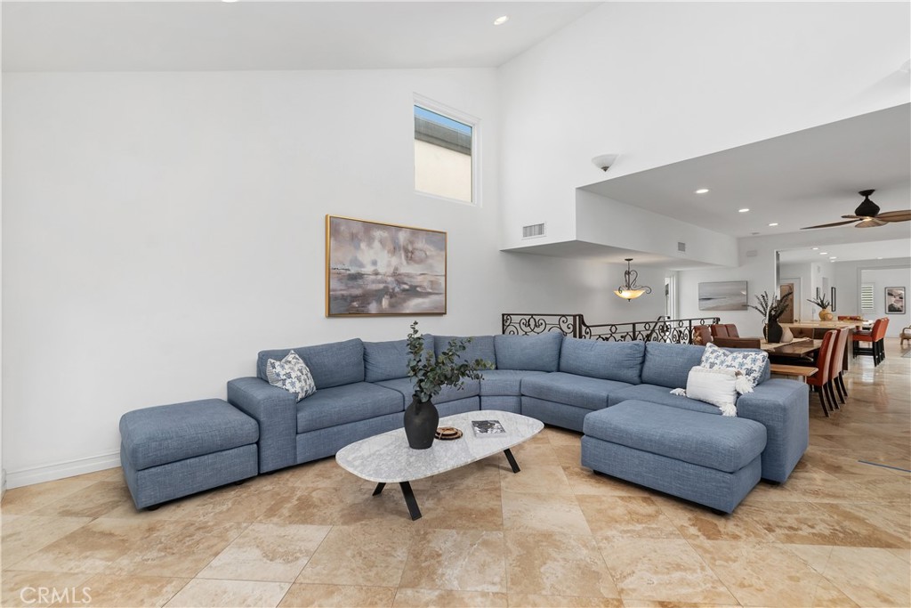 154 12th Street Seal Beach, CA 90740 - Photo 9 of 39 a living room with furniture and a view of kitchen