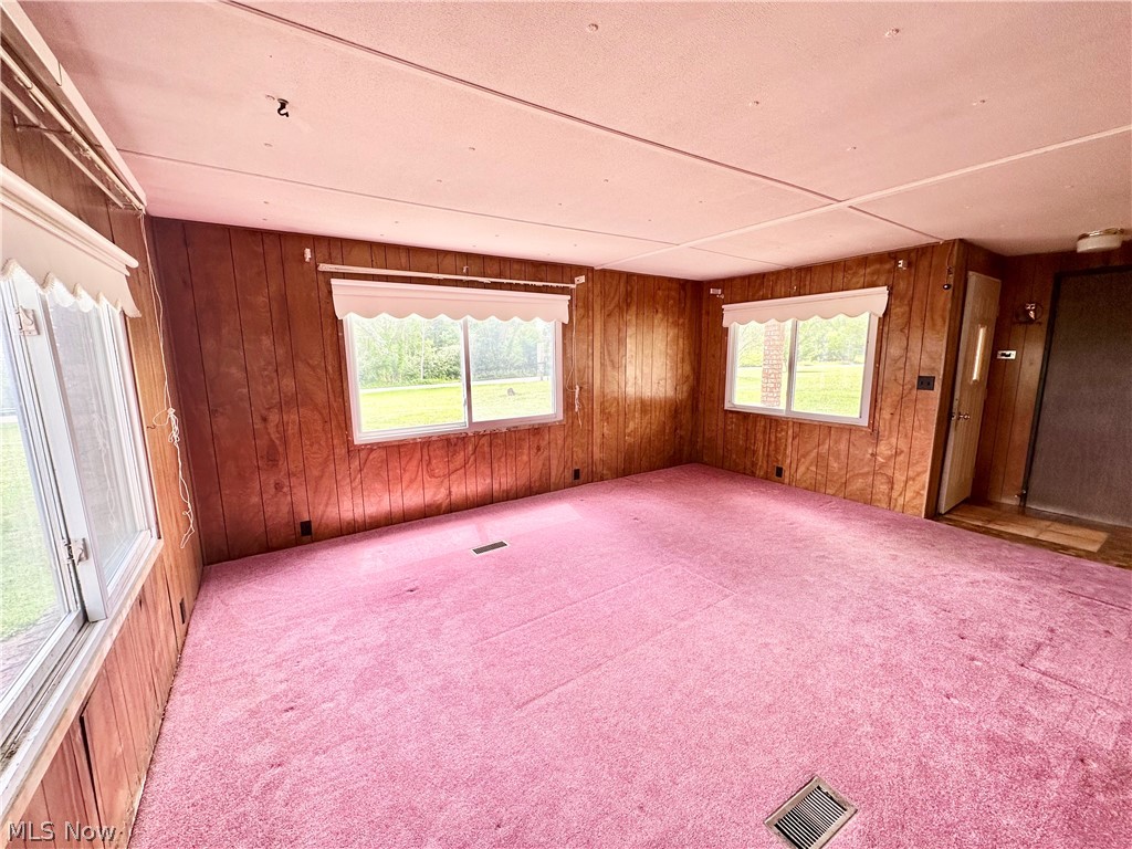 28 Richter Road Colliers, WV 26035 - Photo 3 of 38 Living room featuring carpet flooring