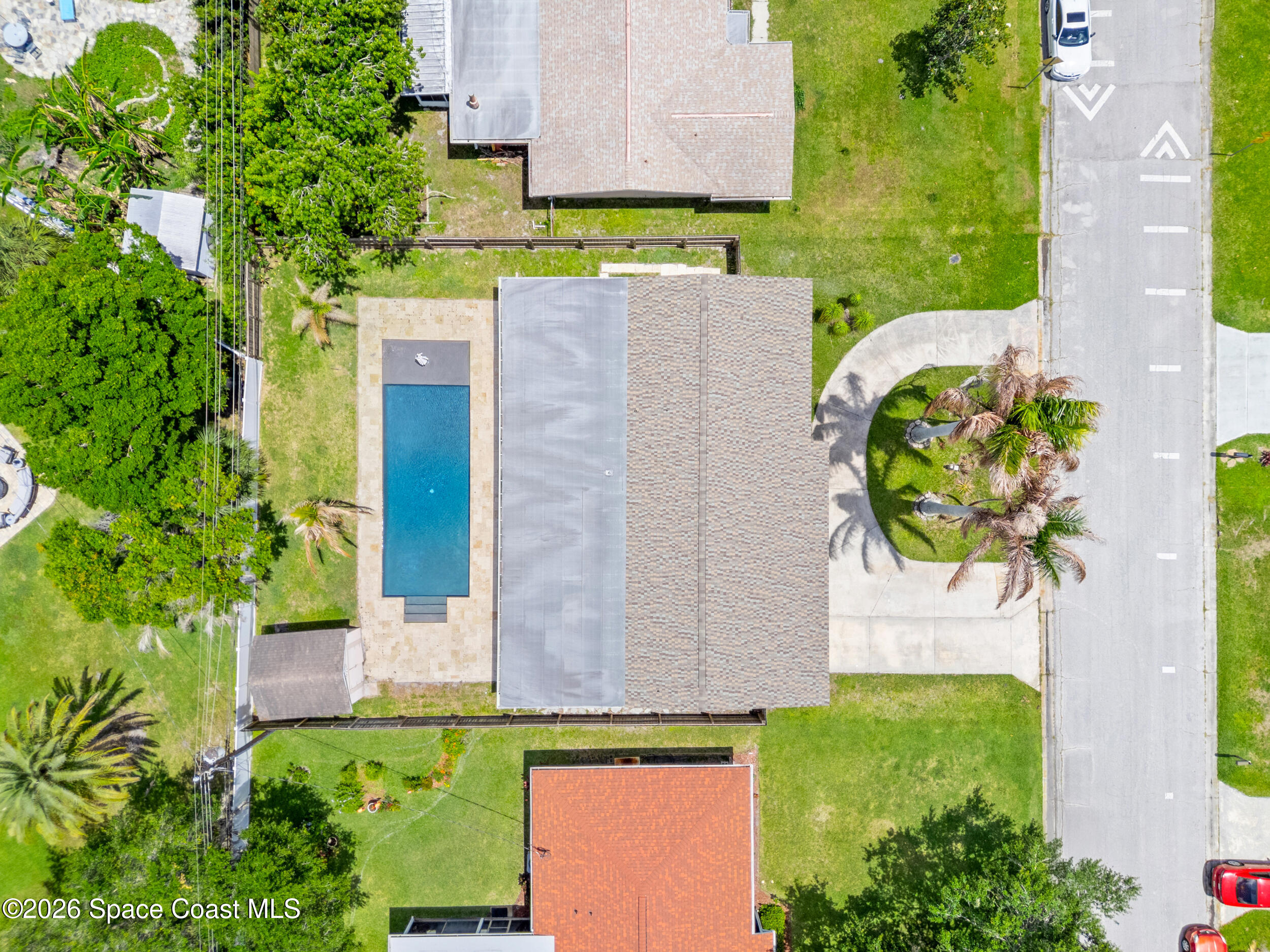 406 Amherst Avenue Melbourne, FL 32901 - Photo 2 of 36 an aerial view of a house with a garden