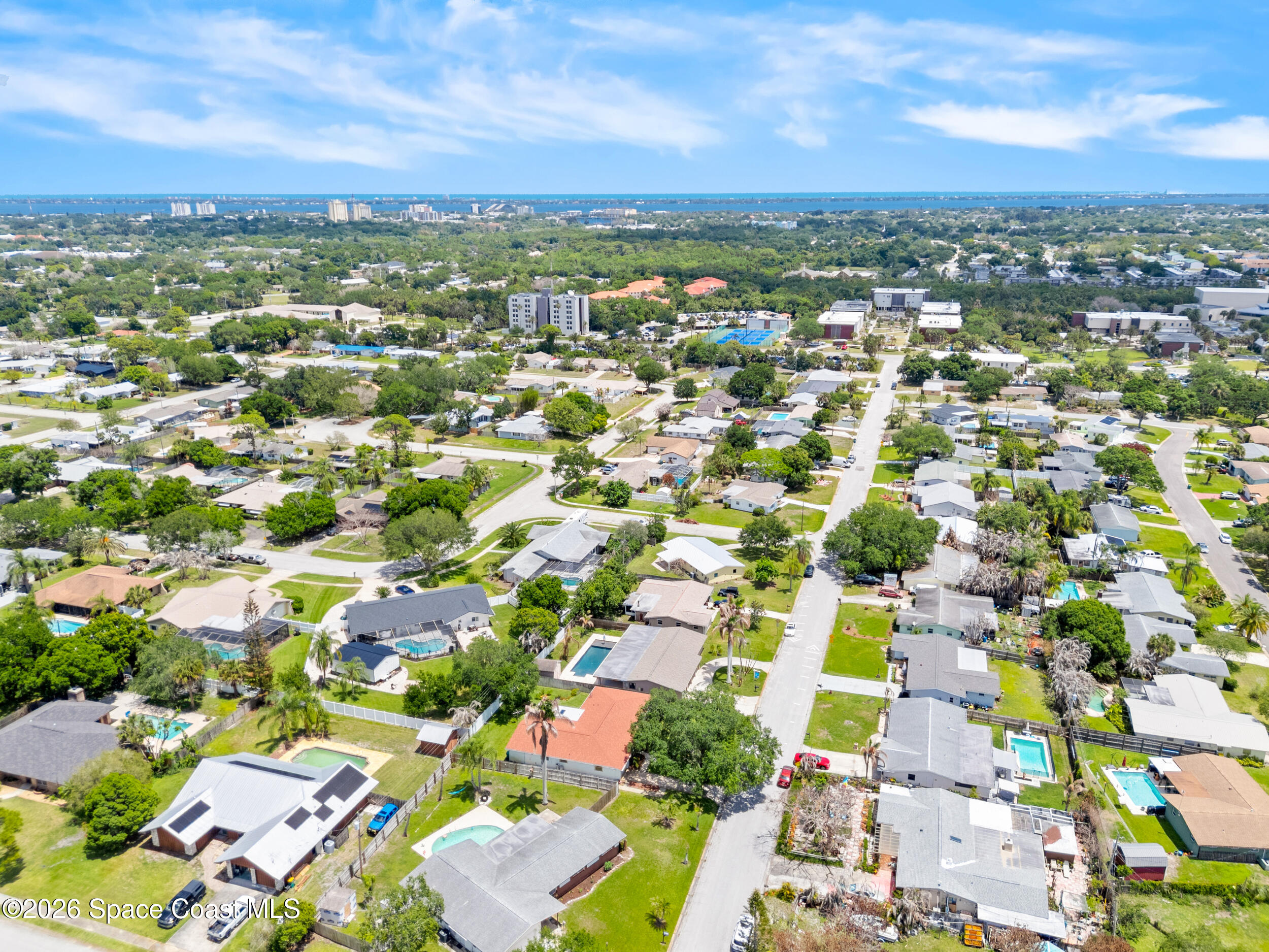 406 Amherst Avenue Melbourne, FL 32901 - Photo 35 of 36 an aerial view of residential houses with outdoor space
