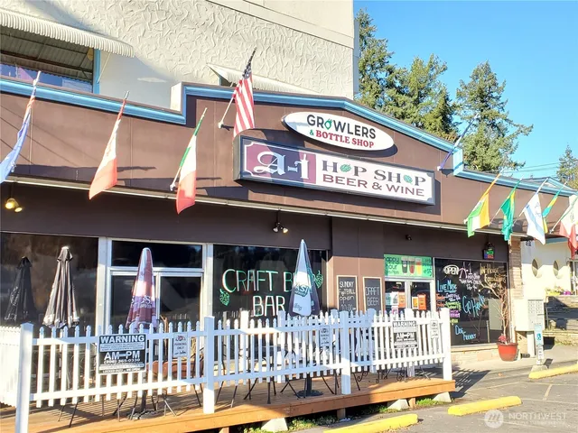 a view of a cafe with a outdoor seating