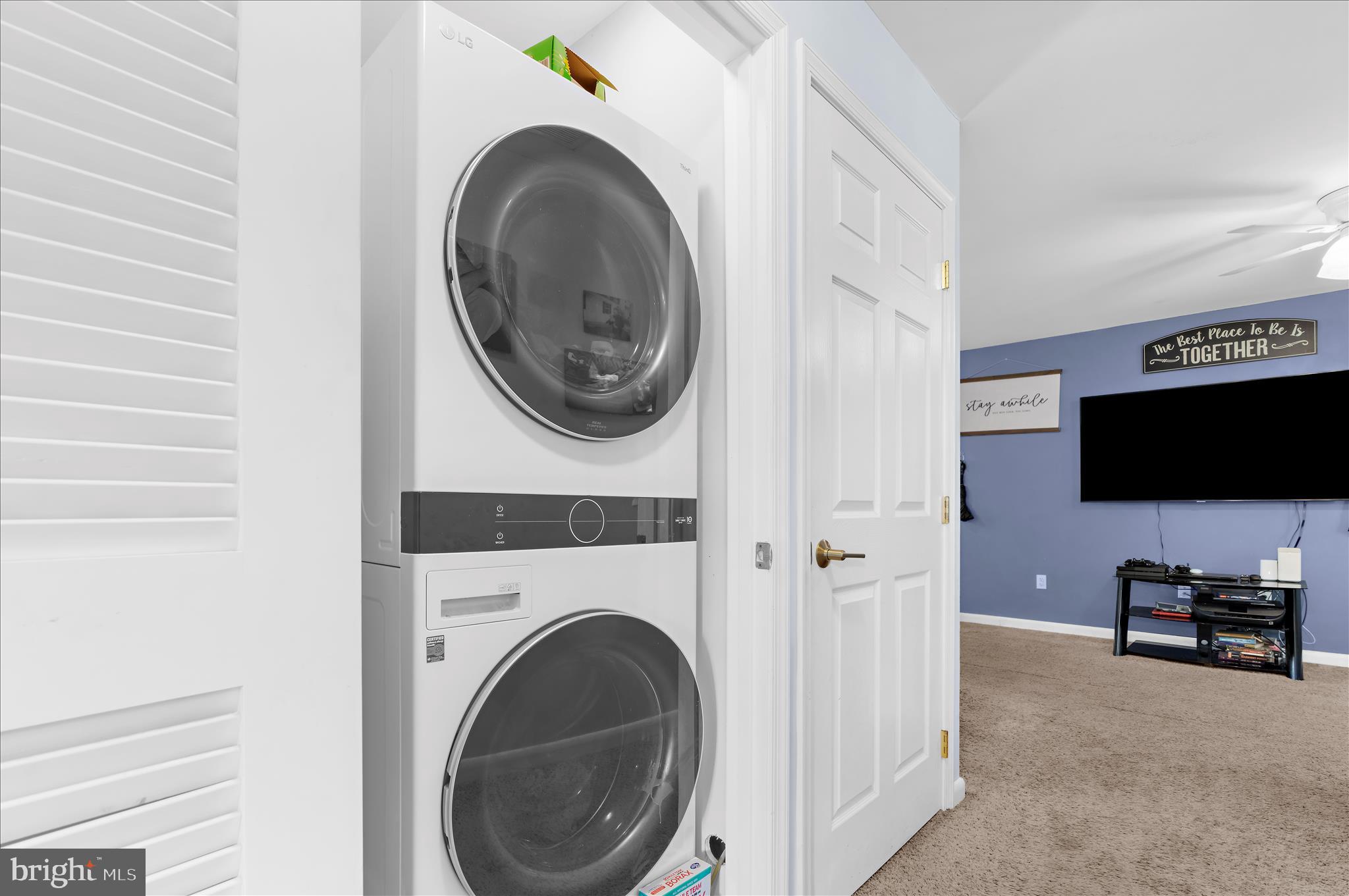 29885 Washington Road Mechanicsville, MD 20659 - Photo 15 of 32 a living room with furniture and a flat screen tv