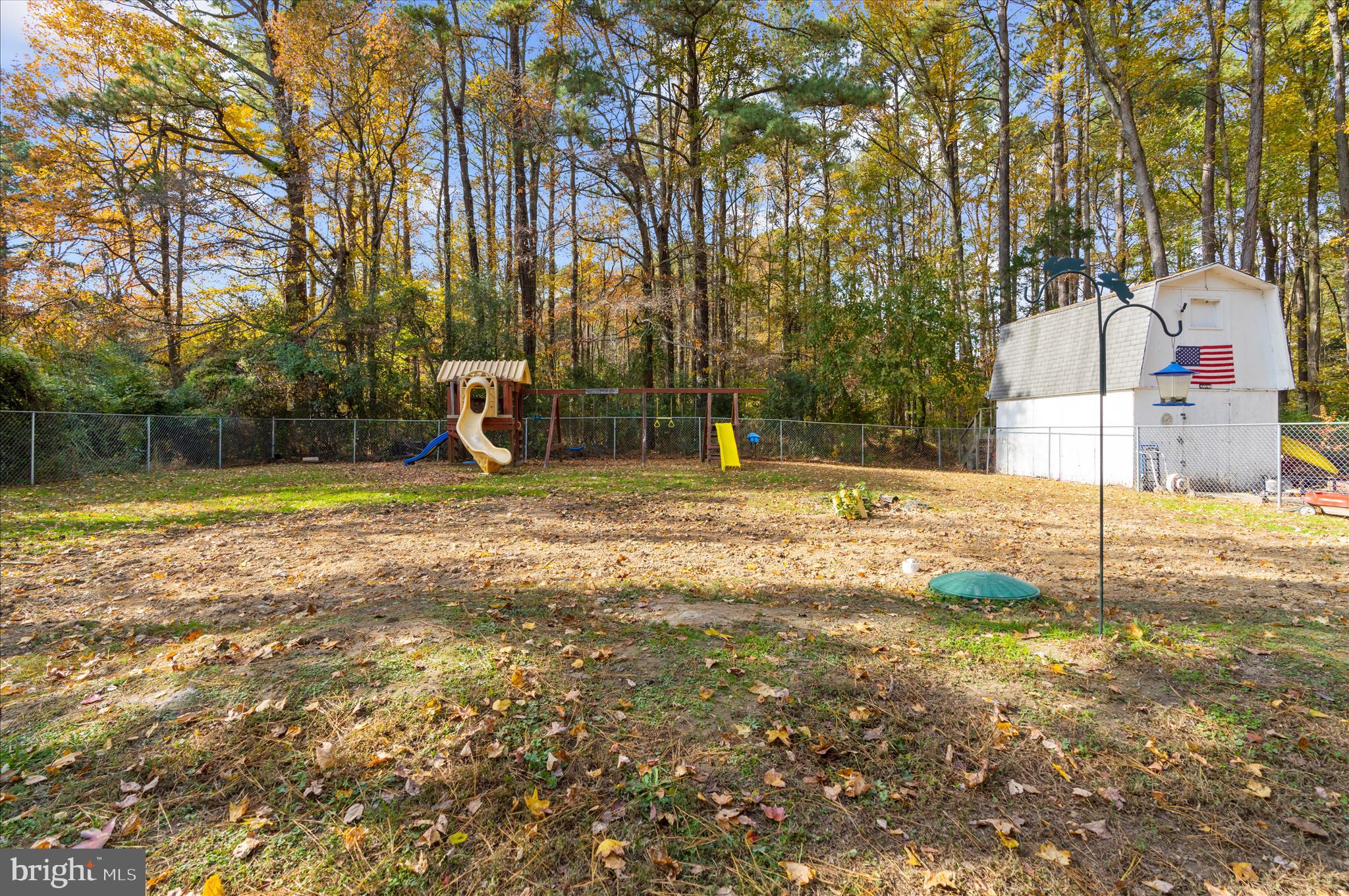 29885 Washington Road Mechanicsville, MD 20659 - Photo 16 of 32 a view of a playground with basketball court