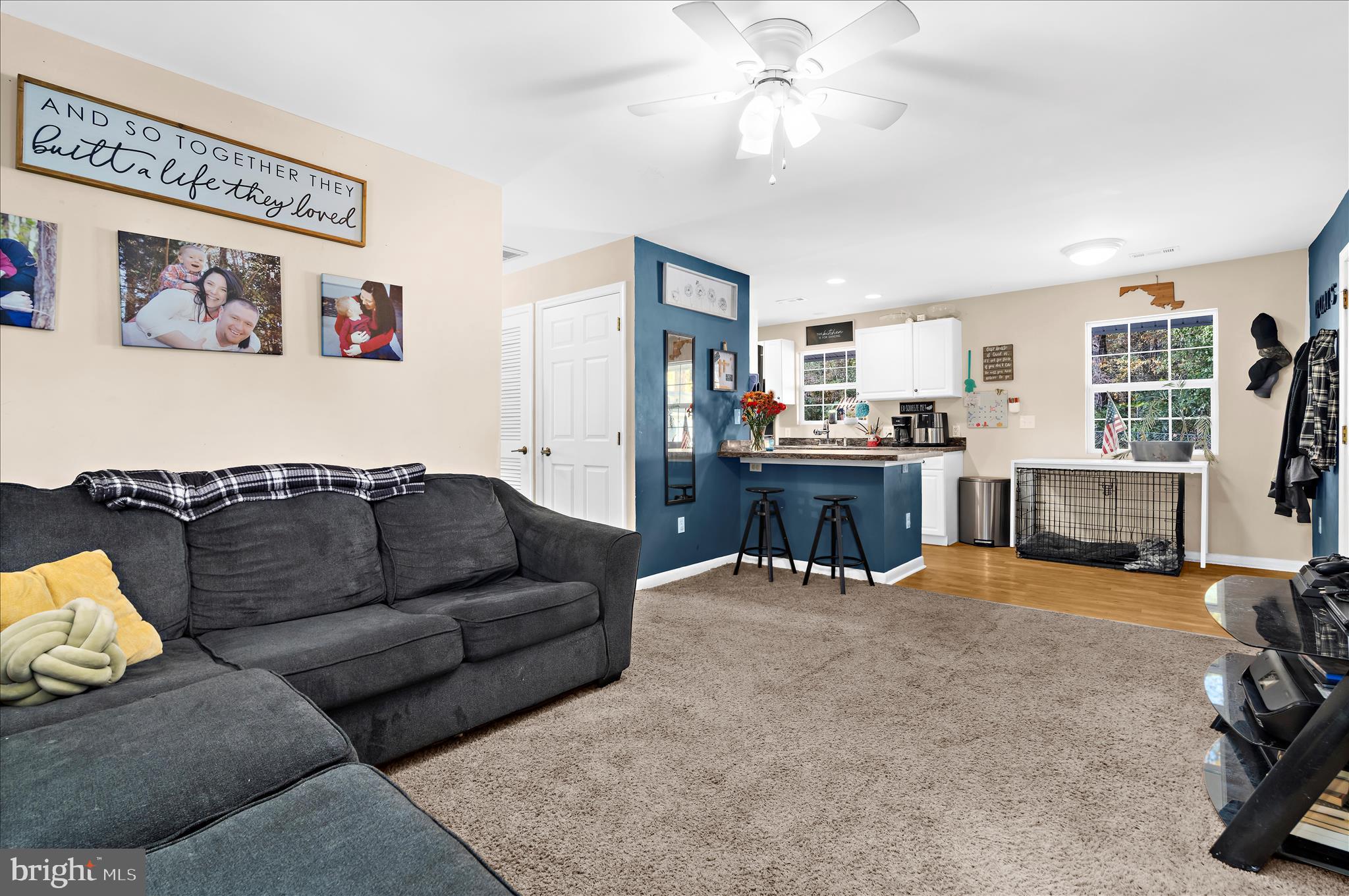 29885 Washington Road Mechanicsville, MD 20659 - Photo 2 of 32 a living room with furniture and a flat screen tv
