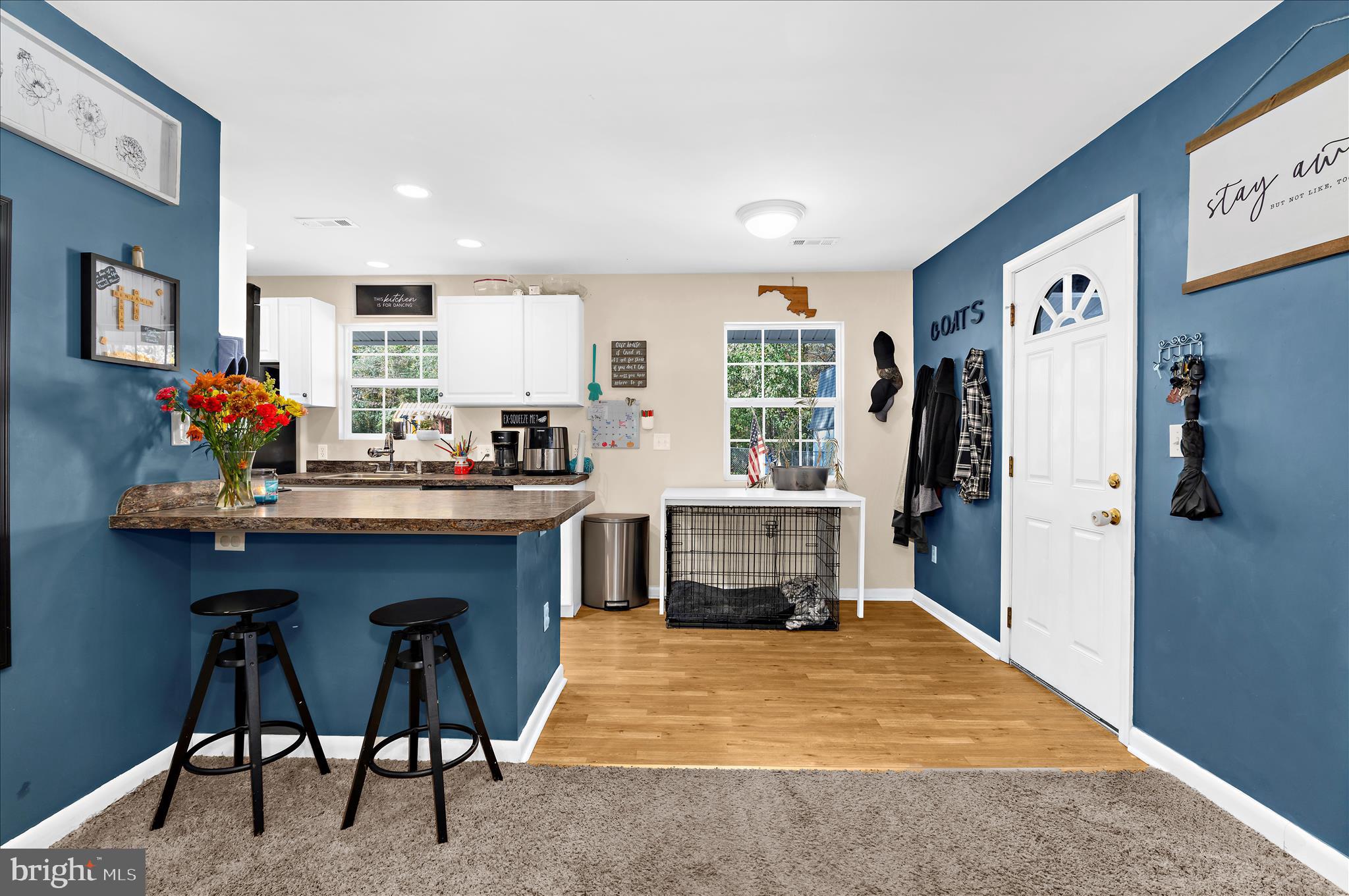 29885 Washington Road Mechanicsville, MD 20659 - Photo 7 of 32 a kitchen with a table and chairs in it