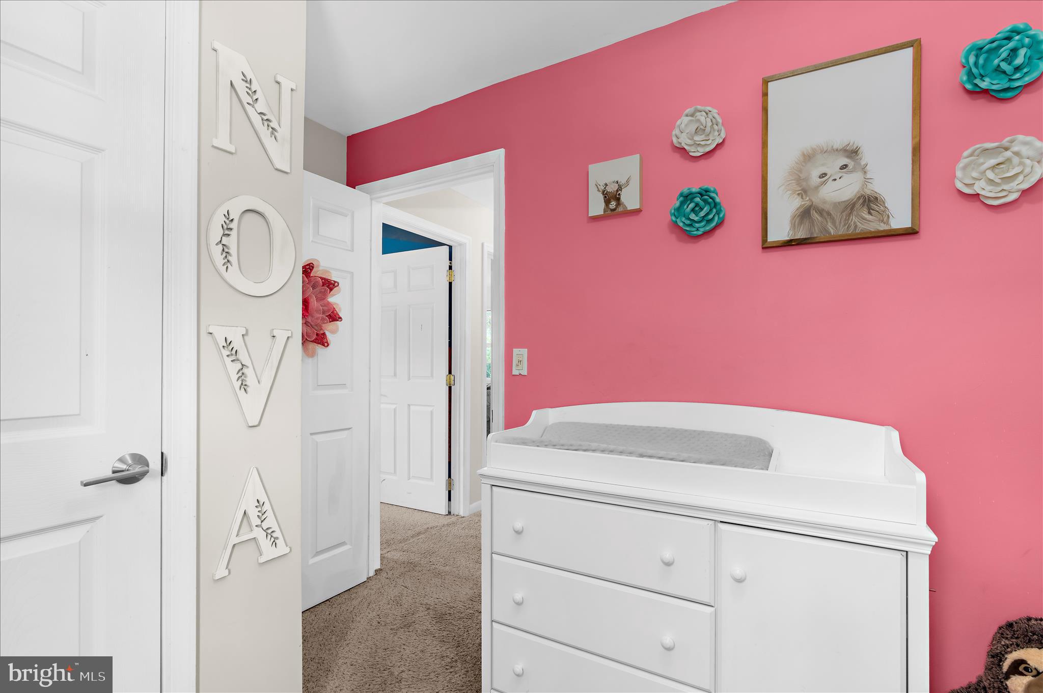 29885 Washington Road Mechanicsville, MD 20659 - Photo 9 of 32 a bathroom with a sink a mirror and cabinets