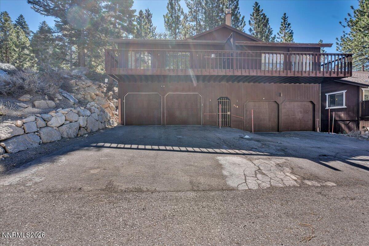 718 Kingsbury Grade Road, Unit B Stateline, NV 89449 - Photo 4 of 41 a front view of a house with a yard
