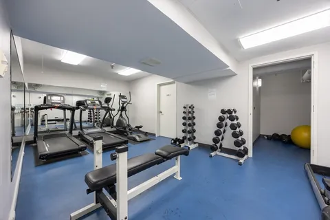 a view of a room with gym equipment