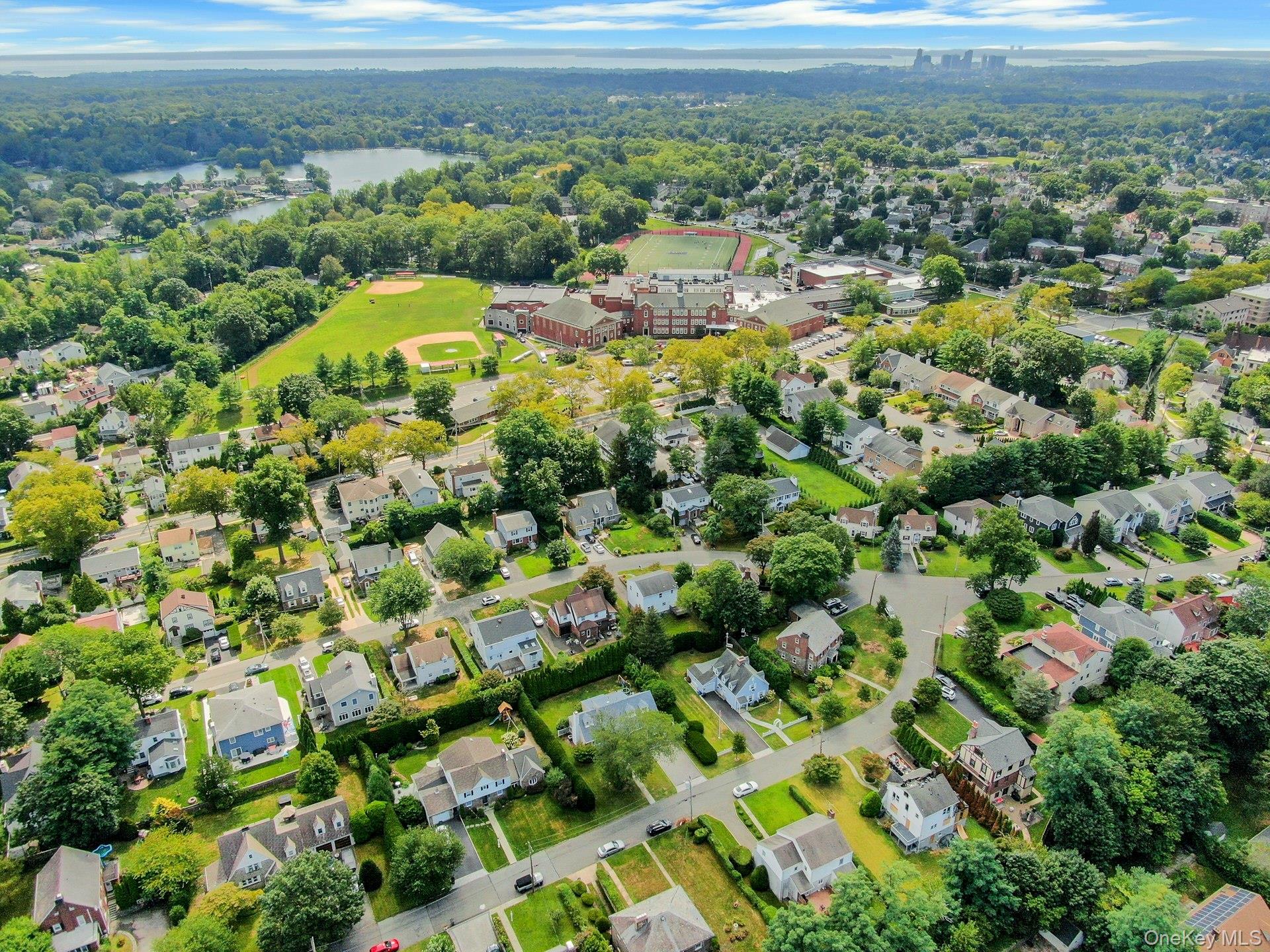 203 Park Avenue Eastchester, NY 10709 - Photo 16 of 17 Aerial view of property and surrounding area featuring a nearby body of water and nearby suburban area