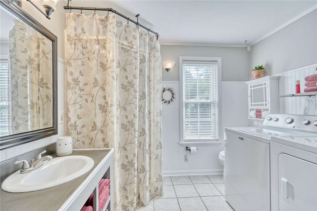 956 Willits Road Ontario, NY 14519 - Photo 11 of 50 Full Bathroom/Laundry off of the living room.