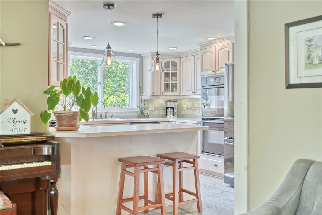 956 Willits Road Ontario, NY 14519 - Photo 13 of 50 Living Room Flows into the kitchen