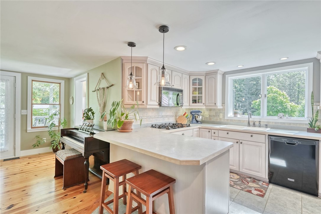 956 Willits Road Ontario, NY 14519 - Photo 14 of 50 Kitchen is open and bright with lots of cabinet sp