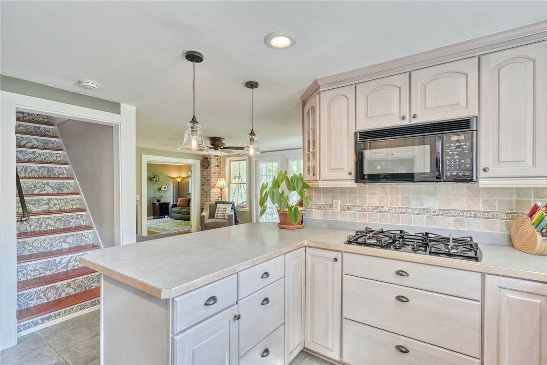 956 Willits Road Ontario, NY 14519 - Photo 15 of 50 Kitchen is open and bright with lots of cabinet sp