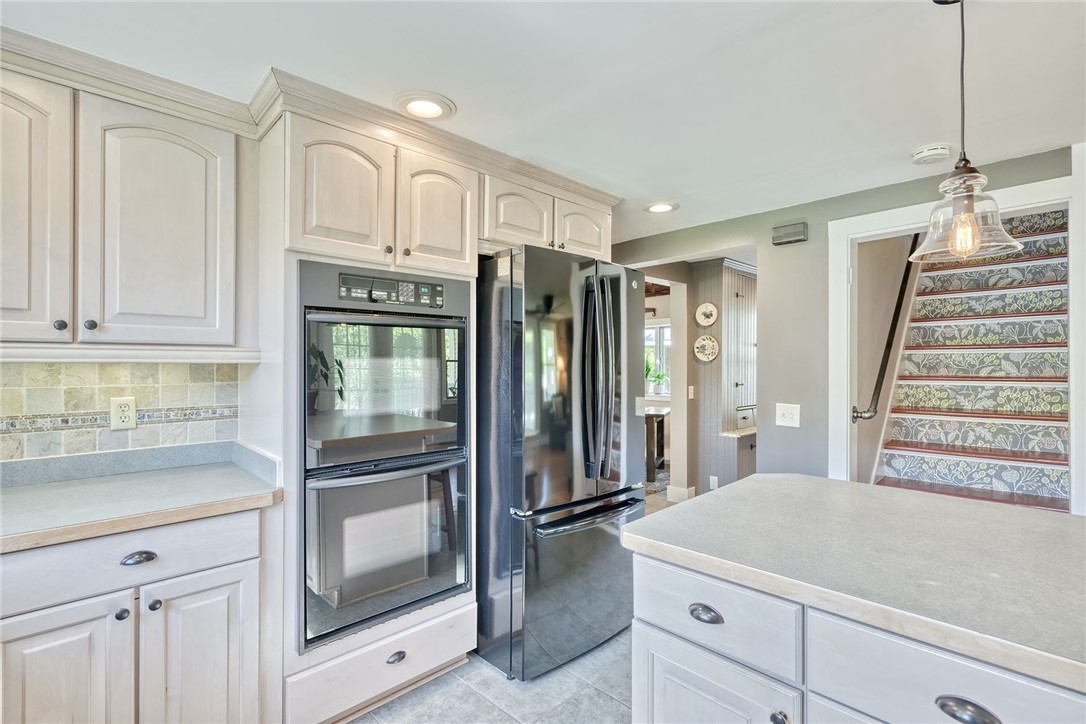 956 Willits Road Ontario, NY 14519 - Photo 16 of 50 Kitchen is open and bright with lots of cabinet sp