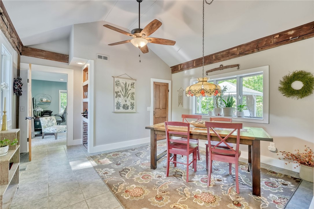 956 Willits Road Ontario, NY 14519 - Photo 18 of 50 formal Dining Room has tiled flooring, vaulted cei