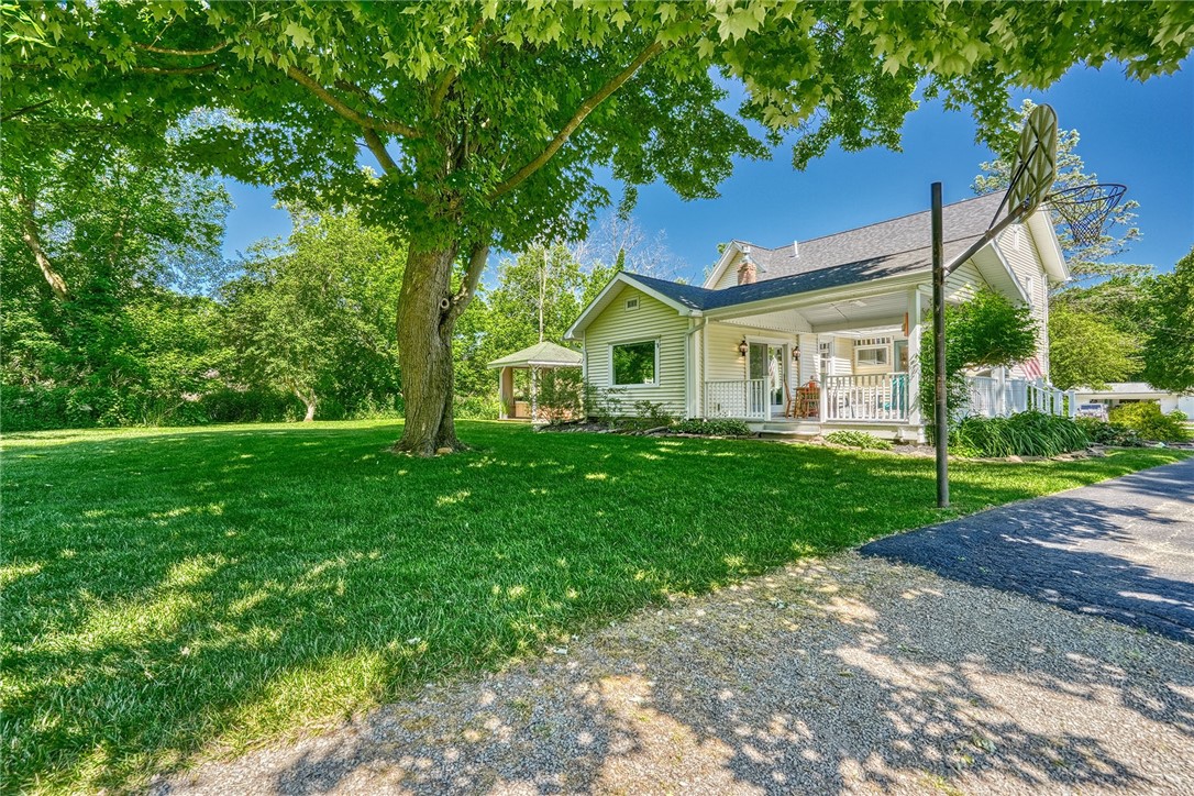 956 Willits Road Ontario, NY 14519 - Photo 35 of 50 View of the back of the house/deck/hot tub
