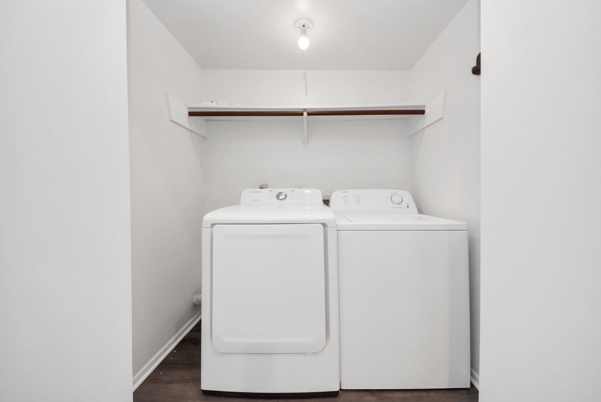 1635 Prairie Mark Lane Houston, TX 77077 - Photo 15 of 32 a utility room with dryer and washer