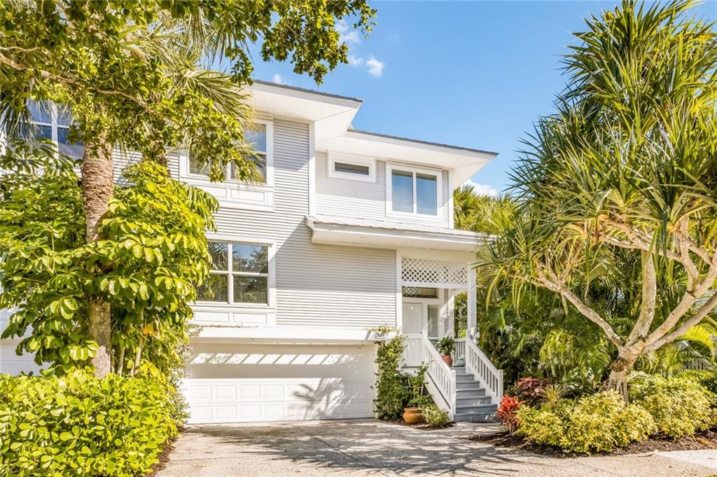 805 South Harbor Drive Boca Grande, FL 33921 - Photo 1 of 1 a front view of a house with garden
