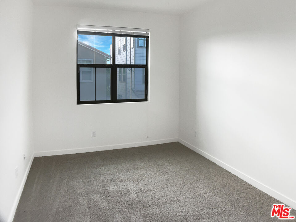 96 Marisol Street Rancho Mission Viejo, CA 92694 - Photo 11 of 26 an empty room with a window